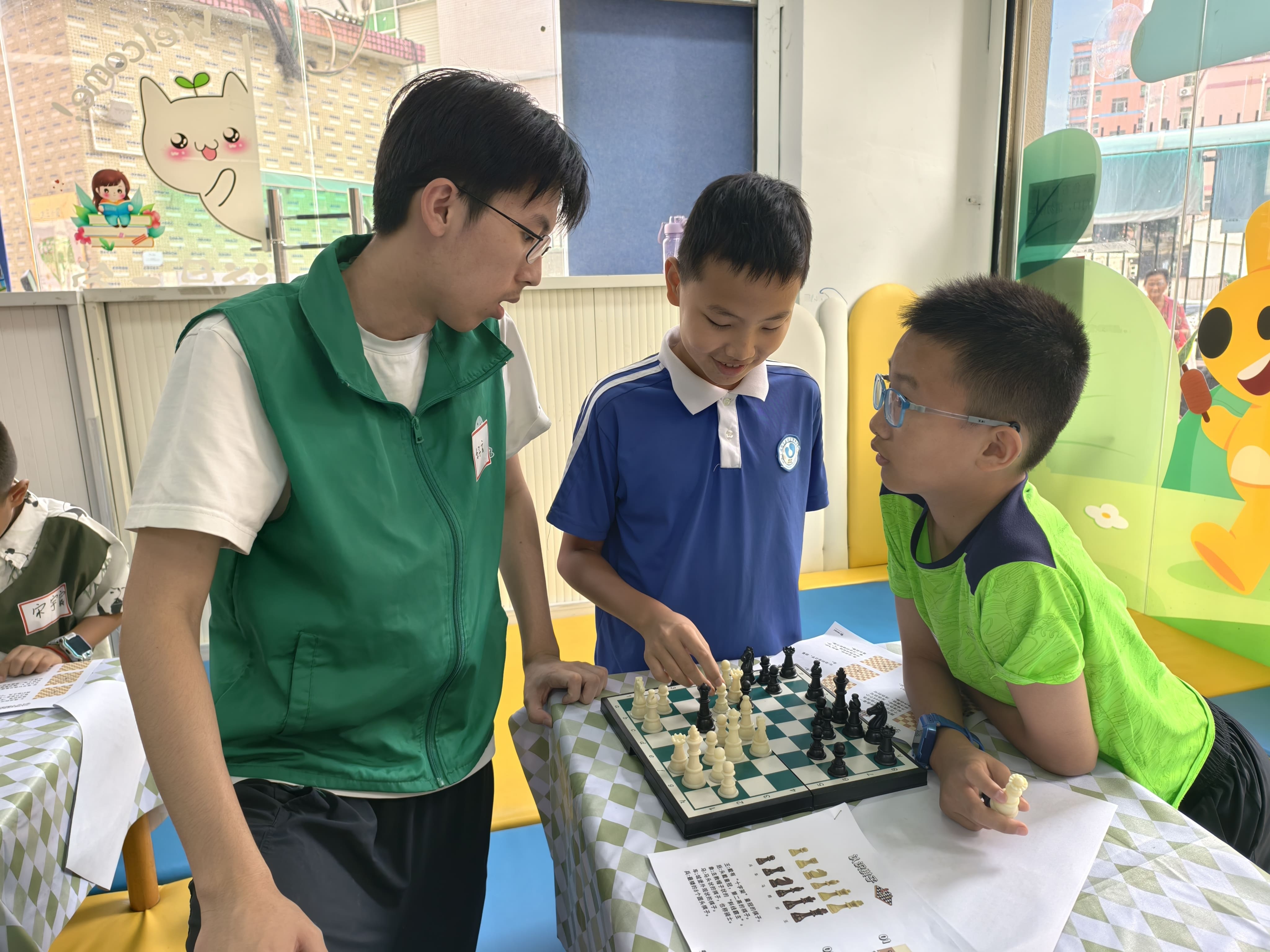 Mentoring migrant children in chess.
